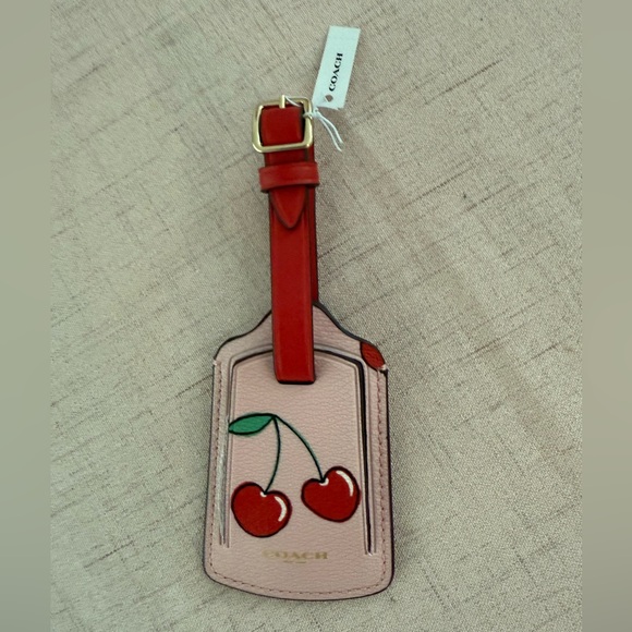Coach Handbags - 🍒NWT COACH Luggage Tag With Heart Cherry Print pink red - CF366
